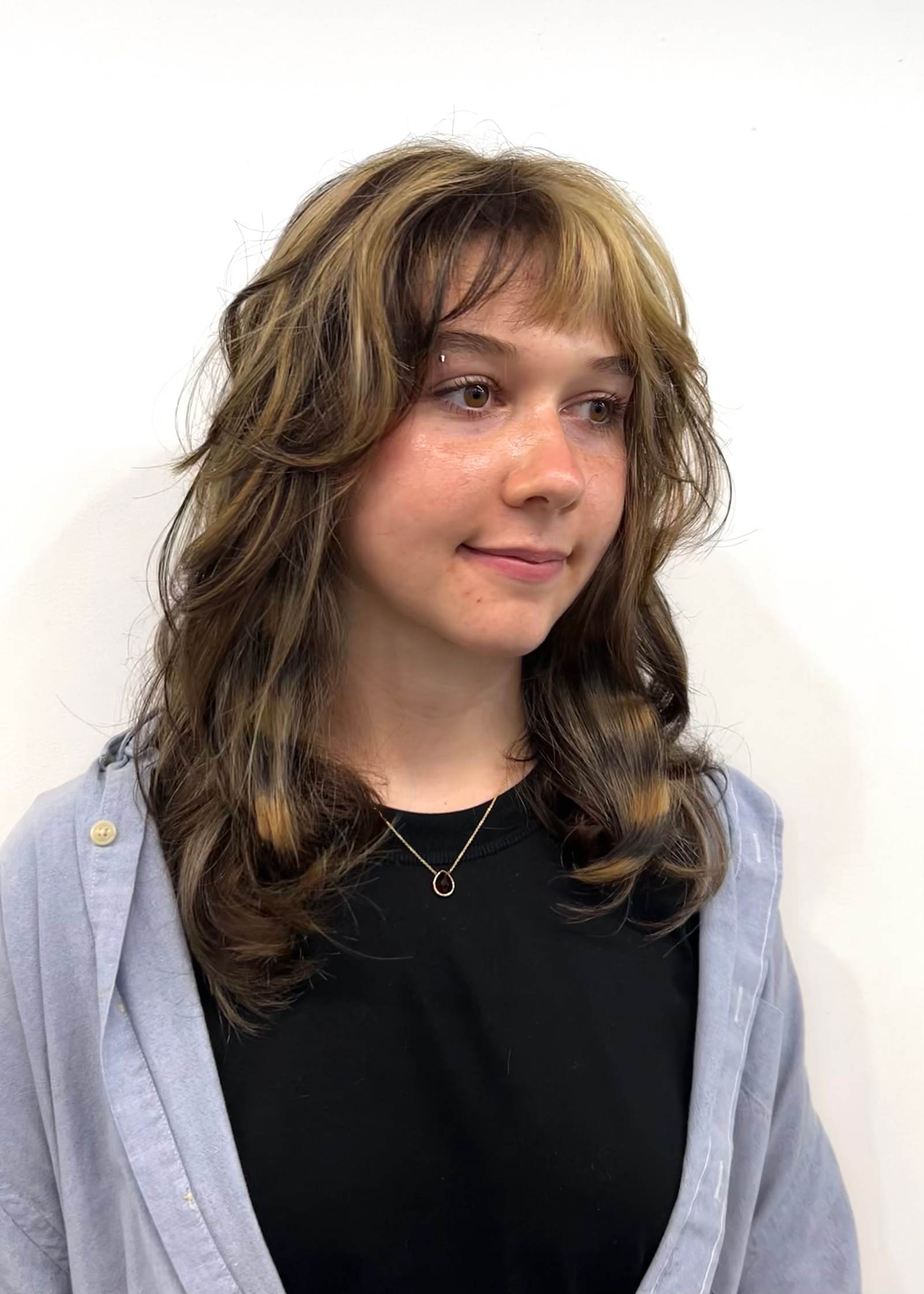 Hidden "peek-a-boo" horizontal hair bands in a blonde and charcoal tone.