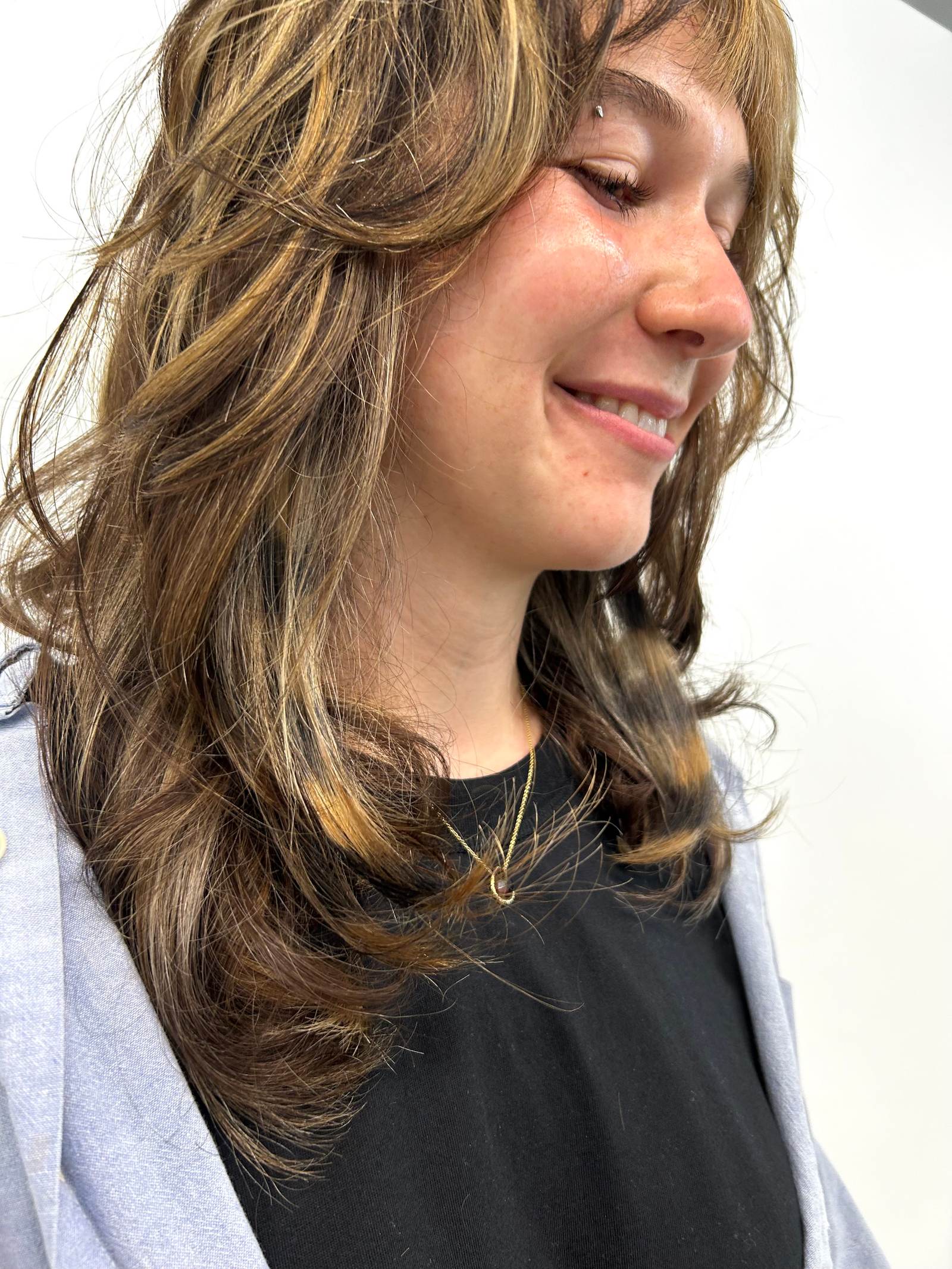 Hidden "peek-a-boo" horizontal hair bands in a blonde and charcoal tone.